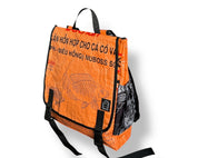 Orange backpack with black text and fish design on a white background