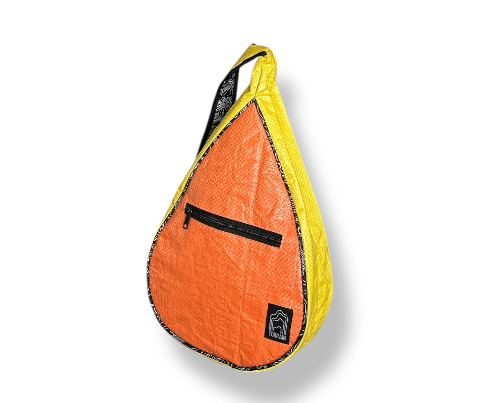 bright funky upcycled sling backpack